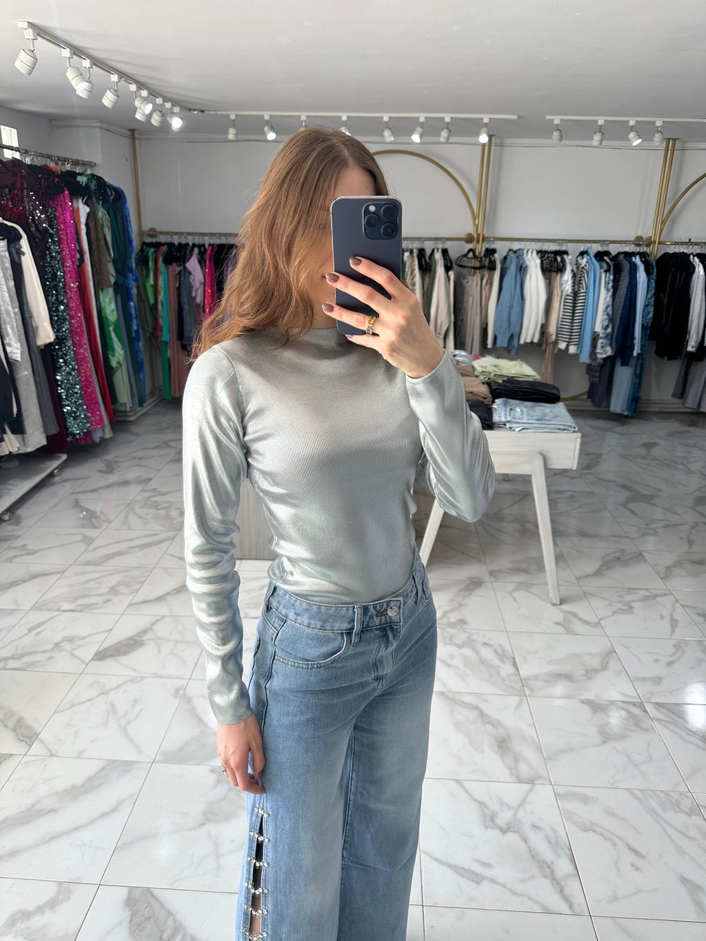 Blusa metálica