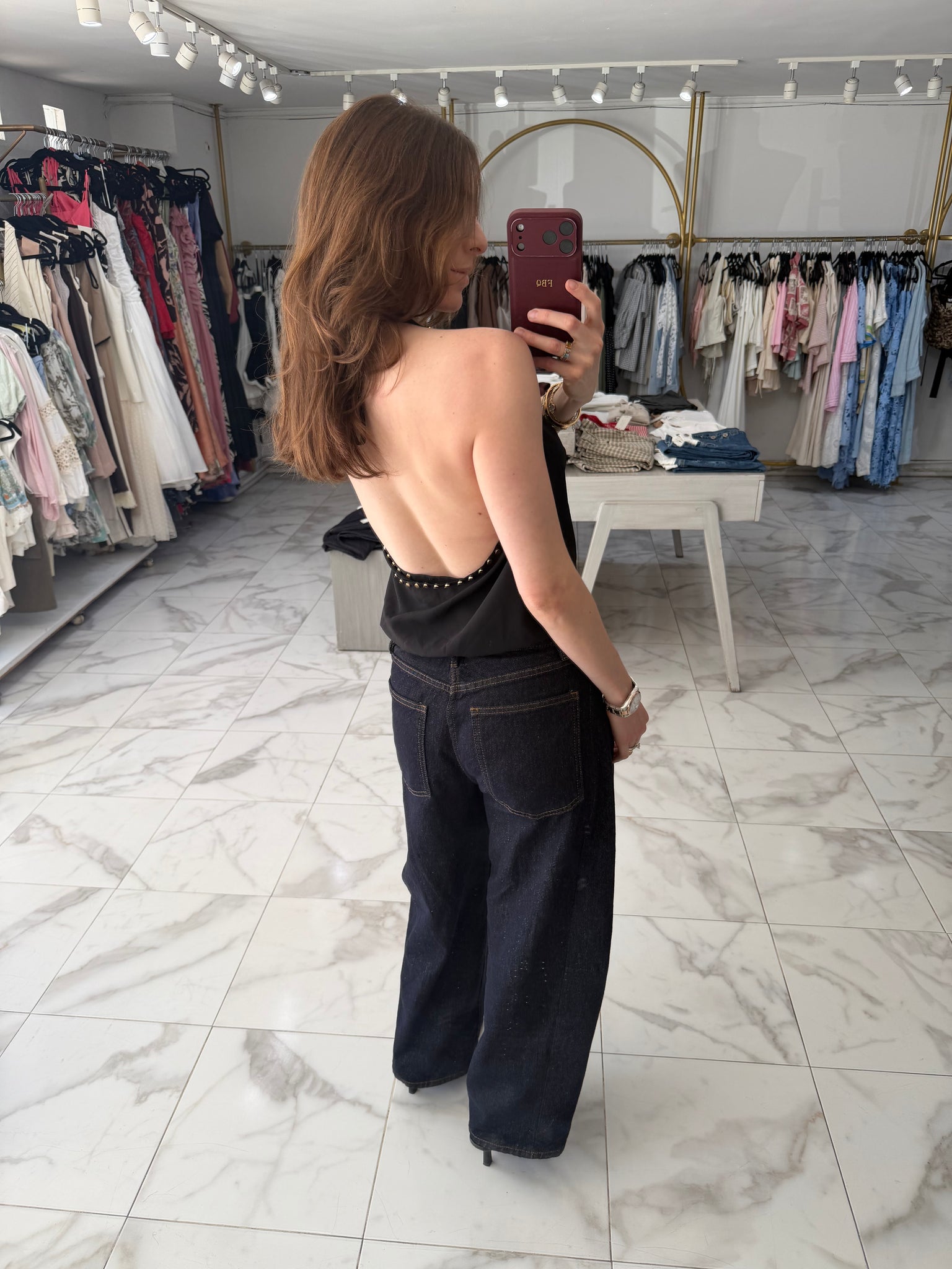 Blusa tachuelas