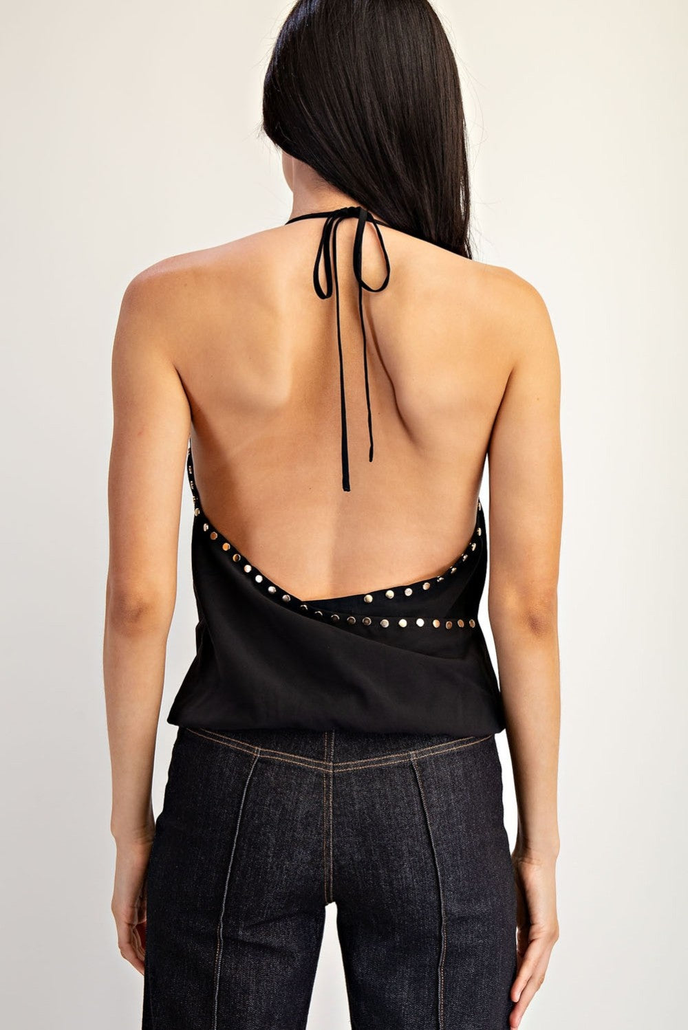 Blusa tachuelas